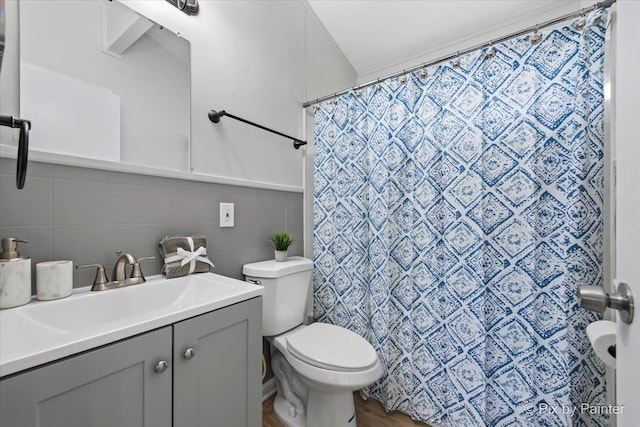 1912 Oakleaf Dr, Mchenry, IL 60050 - full bathroom featuring tile walls, vanity, toilet, and a shower with shower curtain