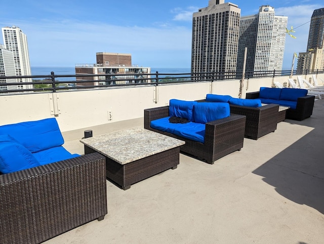 2754 N Hampden Ct Unit 2002, Chicago, IL 60614 - view of patio with an outdoor hangout area, a water view, and a view of city