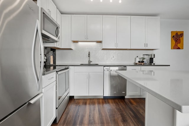 2754 N Hampden Ct Unit 2002, Chicago, IL 60614 - kitchen with stainless steel appliances, tasteful backsplash, dark wood finished floors, and white cabinets