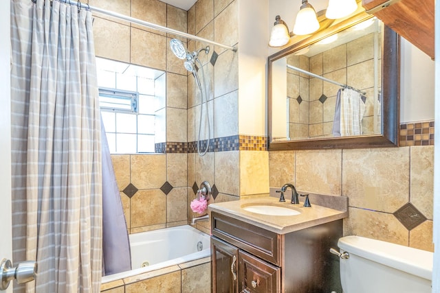 4848 W Belle Plaine Ave Unit 2R, Chicago, IL 60641 - bathroom featuring tile walls, tiled shower / bath, and vanity