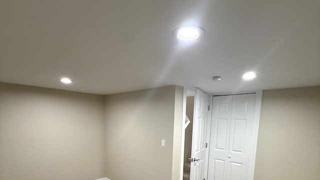 finished basement with recessed lighting