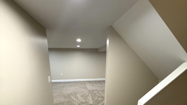 hallway featuring carpet and recessed lighting