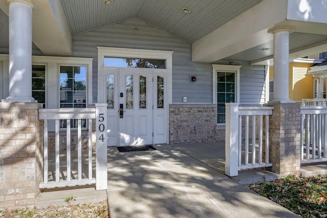 504 E Church St, Champaign, IL 61820 - view of exterior entry featuring a porch