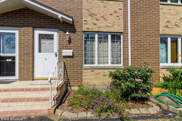 613 E 3rd St Unit 4, Lockport, IL 60441 - property entrance with brick siding