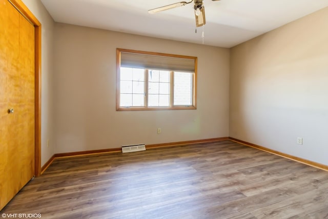 613 E 3rd St Unit 4, Lockport, IL 60441 - empty room featuring wood finished floors and ceiling fan