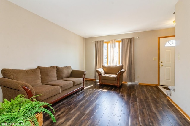 613 E 3rd St Unit 4, Lockport, IL 60441 - living room featuring baseboards and dark wood-style floors
