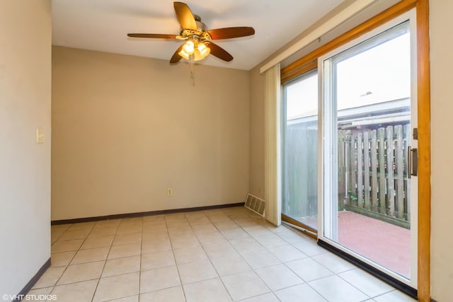 613 E 3rd St Unit 4, Lockport, IL 60441 - spare room with a ceiling fan and baseboards