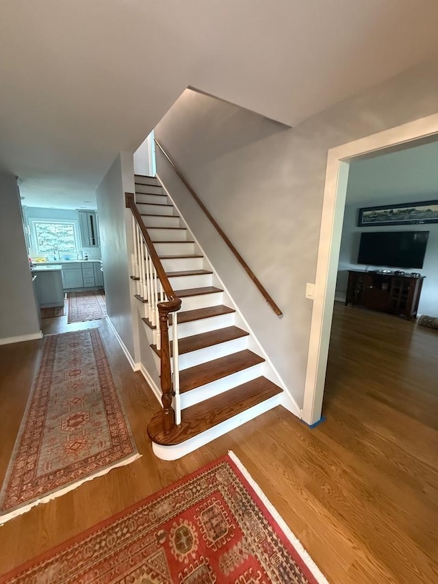 1303 Jane Ave, Naperville, IL 60540 - stairs featuring wood finished floors and baseboards
