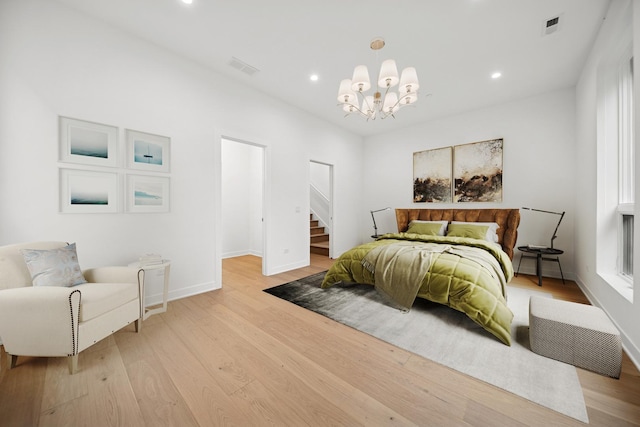 1333 E Madison Park, Chicago, IL 60615 - bedroom with a chandelier, light wood finished floors, and recessed lighting
