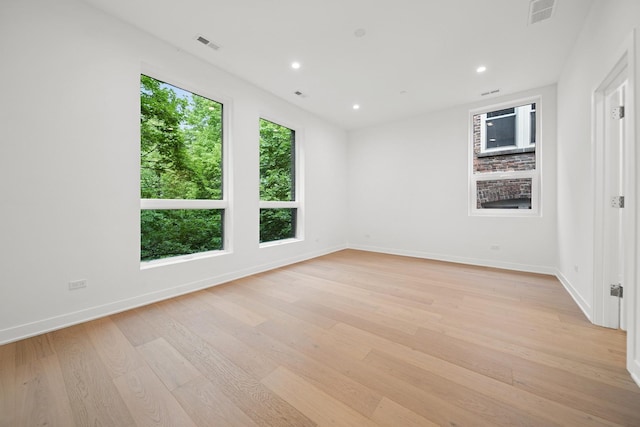 1333 E Madison Park, Chicago, IL 60615 - unfurnished room with light wood finished floors and recessed lighting