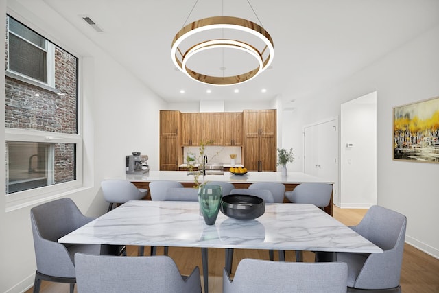 1333 E Madison Park, Chicago, IL 60615 - dining room with wood finished floors, recessed lighting, and a raised ceiling