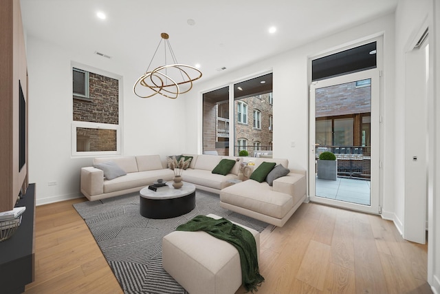 1333 E Madison Park, Chicago, IL 60615 - living area featuring a chandelier, light wood finished floors, and recessed lighting