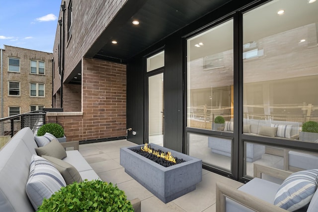1333 E Madison Park, Chicago, IL 60615 - view of patio / terrace with an outdoor living space with a fire pit