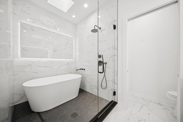 1333 E Madison Park, Chicago, IL 60615 - bathroom featuring a skylight, a freestanding bath, a marble finish shower, recessed lighting, and marble finish floors