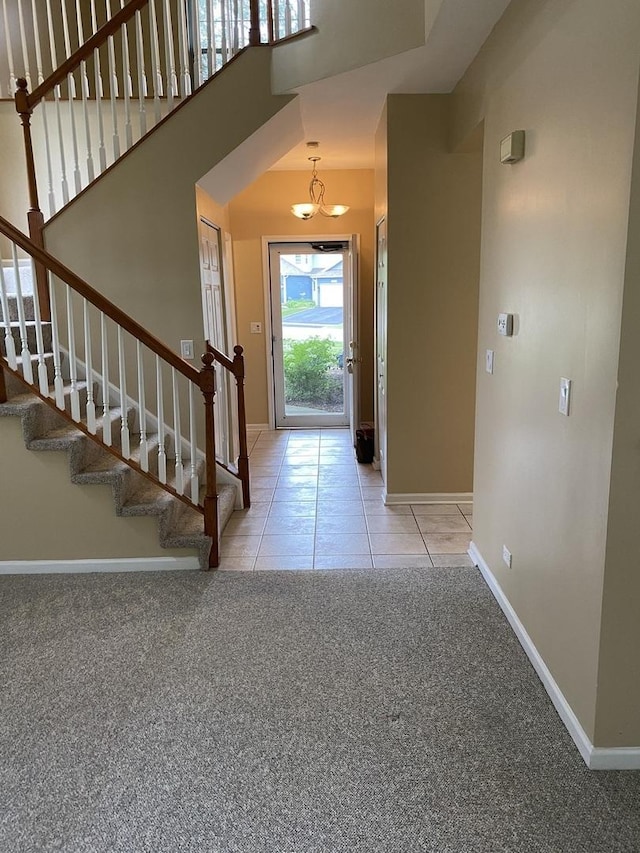 1611 Woodcrest Cir, Mundelein, IL 60060 - carpeted entryway featuring stairs and tile patterned floors