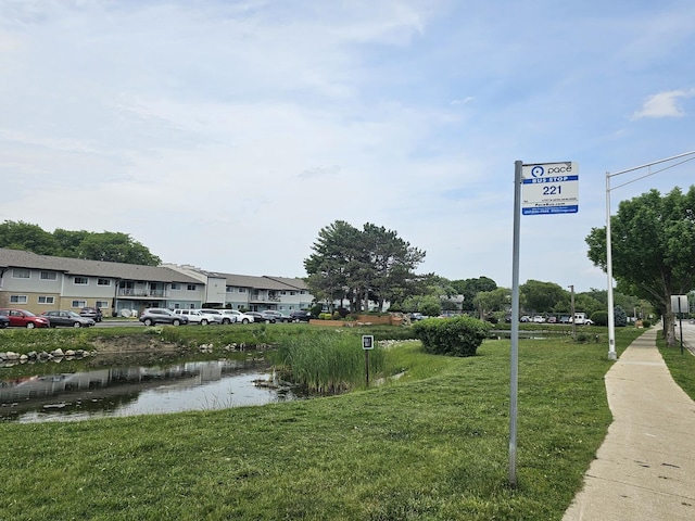 850 E Old Willow Rd Unit 207, Prospect Heights, IL 60070 - view of home's community with a lawn, a residential view, and uncovered parking