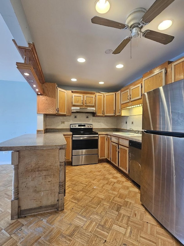 850 E Old Willow Rd Unit 207, Prospect Heights, IL 60070 - kitchen featuring stainless steel appliances, under cabinet range hood, a peninsula, recessed lighting, and a ceiling fan