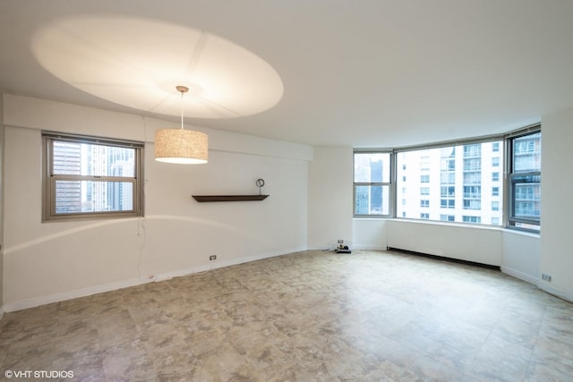 535 N Michigan Ave Unit 1808, Chicago, IL 60611 - spare room featuring baseboards