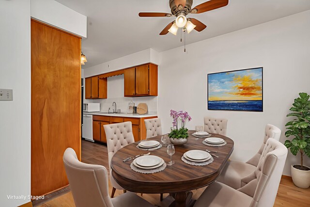 1635 N 4012th Rd, Earlville, IL 60518 - dining room featuring light wood-style flooring and ceiling fan