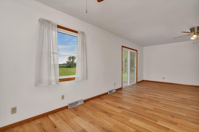 1635 N 4012th Rd, Earlville, IL 60518 - empty room featuring ceiling fan and light wood-style flooring