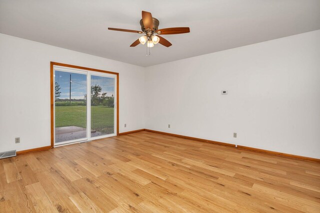 1635 N 4012th Rd, Earlville, IL 60518 - empty room with light wood-style flooring and a ceiling fan