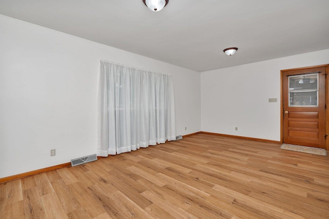 1635 N 4012th Rd, Earlville, IL 60518 - empty room with light wood-type flooring and baseboards