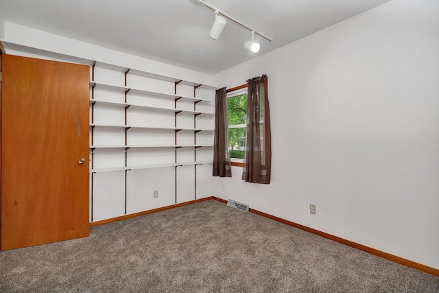 1635 N 4012th Rd, Earlville, IL 60518 - unfurnished room featuring track lighting and carpet flooring
