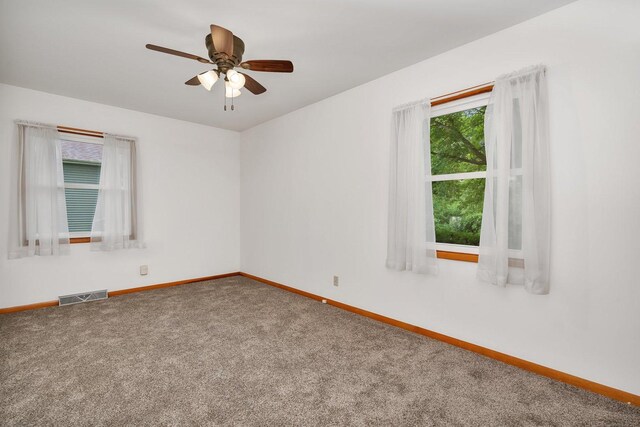 1635 N 4012th Rd, Earlville, IL 60518 - unfurnished room featuring carpet and a ceiling fan