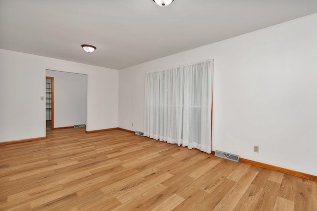 1635 N 4012th Rd, Earlville, IL 60518 - spare room with light wood-style flooring and baseboards