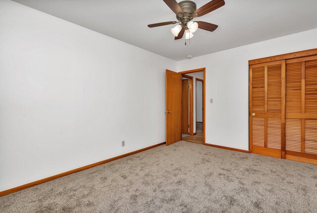 1635 N 4012th Rd, Earlville, IL 60518 - unfurnished bedroom featuring carpet floors, a closet, and ceiling fan