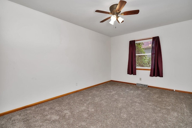 1635 N 4012th Rd, Earlville, IL 60518 - carpeted spare room with baseboards and a ceiling fan