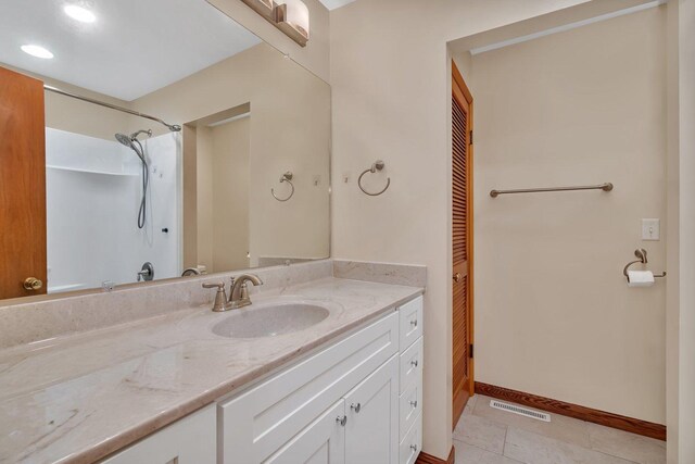 1635 N 4012th Rd, Earlville, IL 60518 - full bathroom with vanity, a closet, and tile patterned flooring