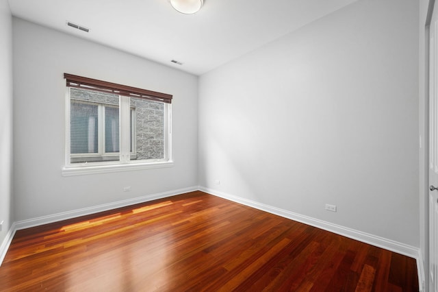 2847 N Pulaski Rd Unit 3S, Chicago, IL 60641 - empty room featuring wood finished floors and baseboards