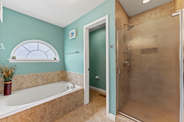1132 Locust Ct, Bartlett, IL 60103 - bathroom featuring a shower stall, a garden tub, and tile patterned flooring