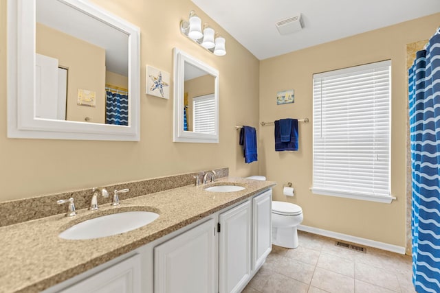 1132 Locust Ct, Bartlett, IL 60103 - bathroom featuring double vanity, tile patterned flooring, and curtained shower