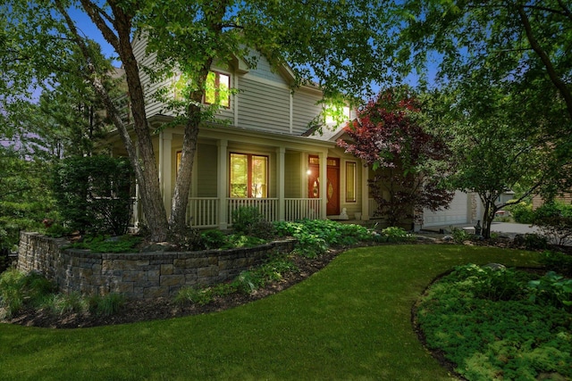 25014 W Nicklaus Way, Antioch, IL 60002 - view of front of property with a porch, an attached garage, and a front lawn
