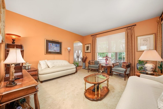 25014 W Nicklaus Way, Antioch, IL 60002 - living room featuring arched walkways and carpet flooring