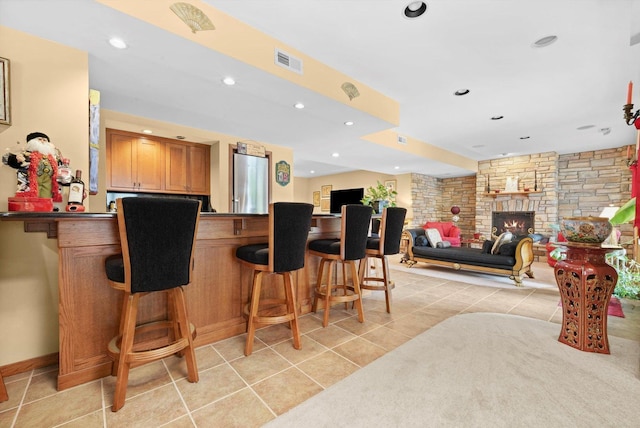 25014 W Nicklaus Way, Antioch, IL 60002 - indoor bar with recessed lighting, light tile patterned floors, a fireplace, and freestanding refrigerator