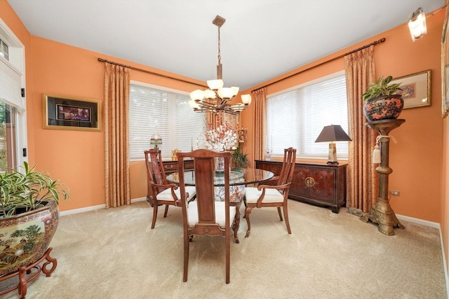 25014 W Nicklaus Way, Antioch, IL 60002 - dining room featuring a chandelier and light carpet