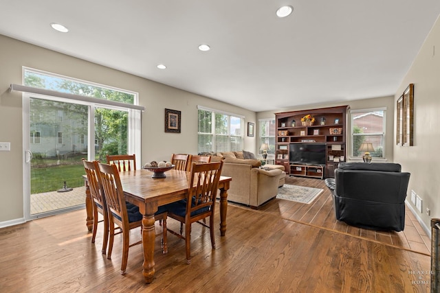 11582 Beacon Ave, Huntley, IL 60142 - dining space with dark wood-style floors, recessed lighting, and baseboards