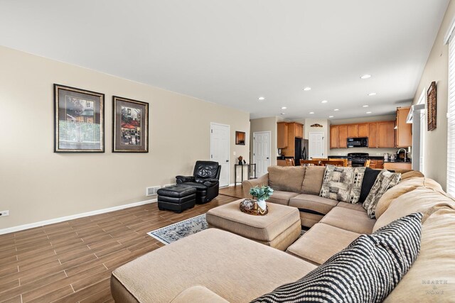 11582 Beacon Ave, Huntley, IL 60142 - living room featuring recessed lighting and wood finished floors