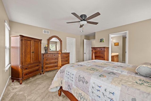 11582 Beacon Ave, Huntley, IL 60142 - bedroom featuring light colored carpet, a ceiling fan, and ensuite bath