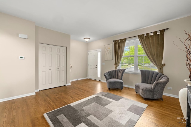 11582 Beacon Ave, Huntley, IL 60142 - living area featuring wood finished floors and baseboards