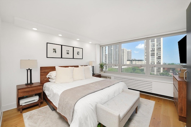 88 W Schiller St Unit 1001L, Chicago, IL 60610 - bedroom featuring light wood-style flooring and recessed lighting