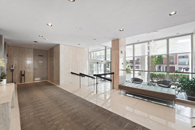 88 W Schiller St Unit 1001L, Chicago, IL 60610 - building lobby featuring recessed lighting and wooden walls