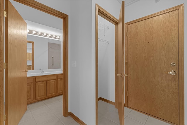 5055 W Madison St Unit 511, Skokie, IL 60077 - hall with light tile patterned floors