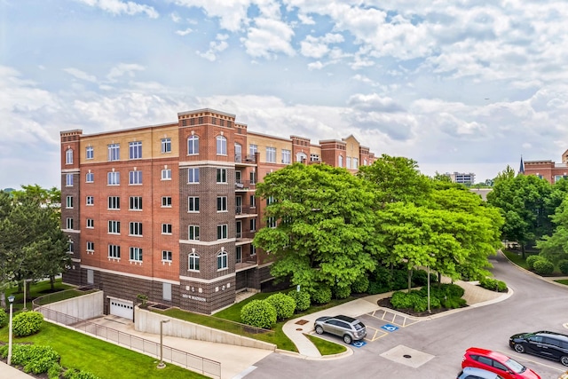 5055 W Madison St Unit 511, Skokie, IL 60077 - view of apartment building / complex with uncovered parking
