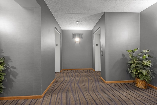 5055 W Madison St Unit 511, Skokie, IL 60077 - hallway featuring carpet and baseboards