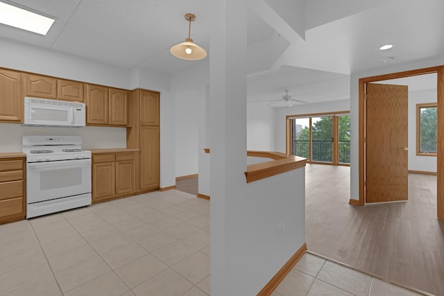 5055 W Madison St Unit 511, Skokie, IL 60077 - kitchen featuring white appliances, light countertops, decorative light fixtures, light tile patterned flooring, and recessed lighting