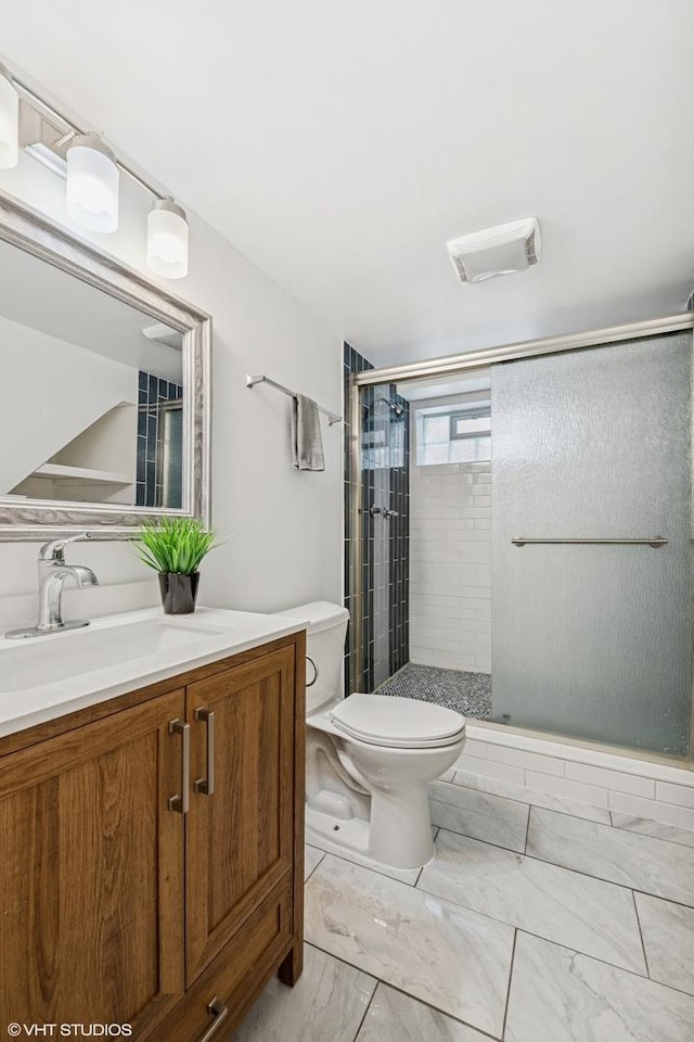 5247 N California Ave, Chicago, IL 60625 - full bath with marble finish flooring, vanity, and a shower stall
